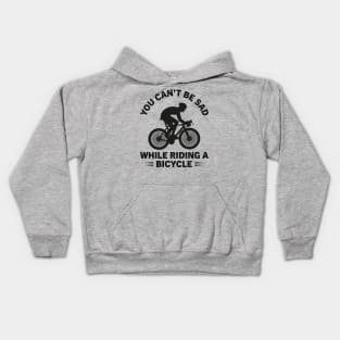 You can not be sad while riding a bicycle.T-shirt design 2022. Kids Hoodie